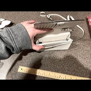 Michael Kors small purse new never used.